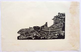 Μαύρη βάρκα στη στεριά